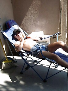 Sunbathing Topless And Teasing