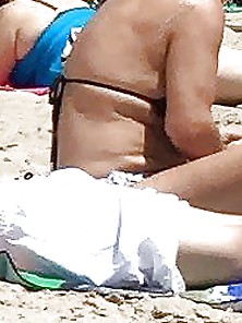 Teen Boy And His Mom On Beach