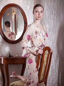 Floral Get-Up Hottie Looks At Her Own Reflection Before Strippin