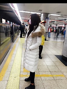 Asian Ladies In Long White Down Coats