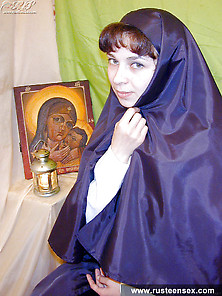 Russian Teen Nun Masturbates With Red Dildo