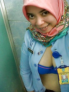 Indonesia- Indo Hijab Chick In Uniform Nude Photos