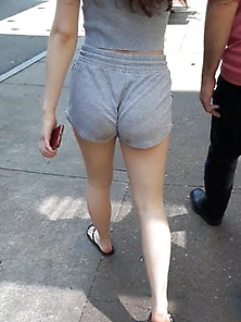 Cute Girl Walking In Shorts