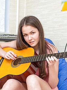 Female Guitar Player Tries To Create Sexual Pleasure Symphony Us