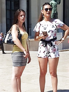Two Girls In Short Playsuits And Miniskirt