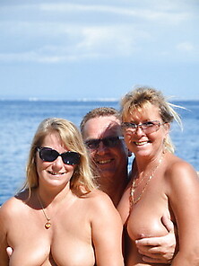 Hot Threesome On The Beach
