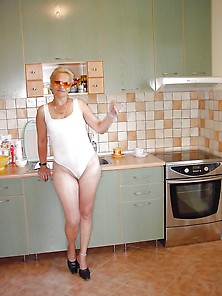 Horny Housewife Naked In The Kitchen
