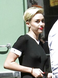 Sultry Miley Cyrus Braless Under Her Dress