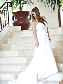 Danielle Poses In A Long White Gown
