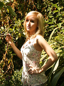 Blonde Teen In A Nude Session In The Garden