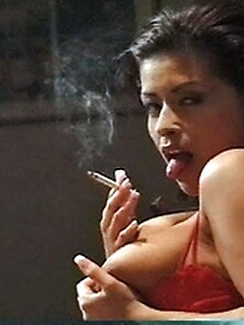 Latina Spreads Legs Smokes