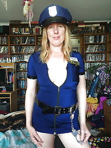 Sexy Tintingirl In A Police Costume
