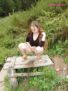 Dirty Teen Slut Sits For A Piss On A Picnic...
