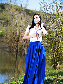Pale-Skinned Brunette Takes Off Her Long,  Long Skirt To Show Her