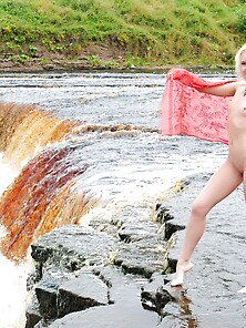 Pale Babe With Small Boobies Bending And Teasing At The Waterfal