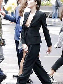 Milla Jovovich Nipple Slip While On A Photo Shoot For Vogue Maga