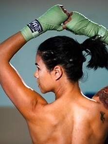 Exotic Tattooed Fighter In Ponytail Posing...