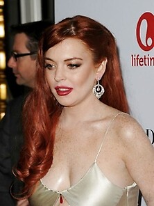 Lindsay Lohan Shows Off Her Freckled Cleavage