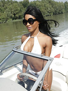 This Busty Ebony Babe Is Having Hot Interracial Sex On A Boat In