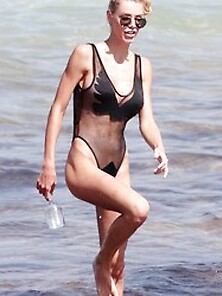 Lisa Hochstein Gets Wet In A See Though Bodysuit
