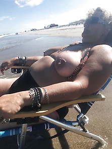 He Likes To Show Her Tits On The Beach