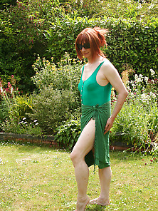 Redhaired Tranny In Swimsuit Bronzing