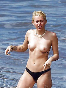 Miley Cyrus Topless On The Beach