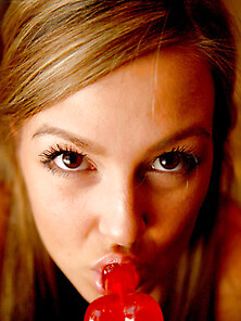 Carmen Shows Off Her Oral Skills With A Penis Lollipop