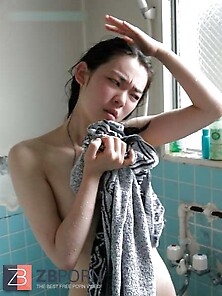 Chinese Lady Taking A Shower