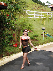 Pretty Shemale In Bustier & Thong Posing Outdoor