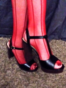 Red Fishnets And Black Heels