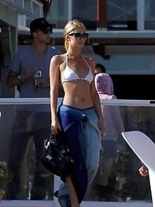 Paris Hilton Pokies In A White Bikini Top