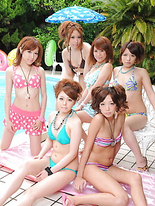 Oriental Girlfriends In Skimpy Bikinis Rest Half-Naked With Men