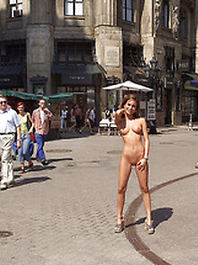 Naked Brunette Takes Walk