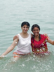 Indian Women Bathing At Sea Ganga