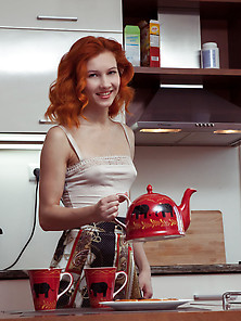 Curly-Haired Redhead Spreading Her Slender Legs In The Kitchen V