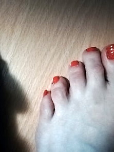Feet And Toes With Nailpoish